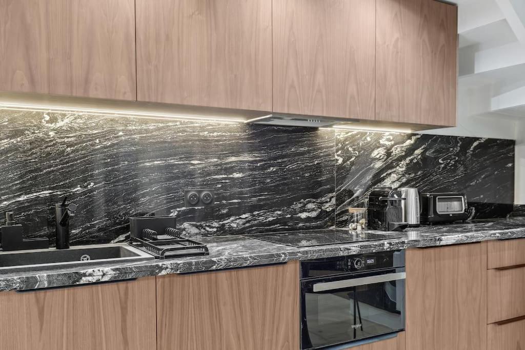 Appartamento Duplex Parisien Pres Du Louvre Esterno foto