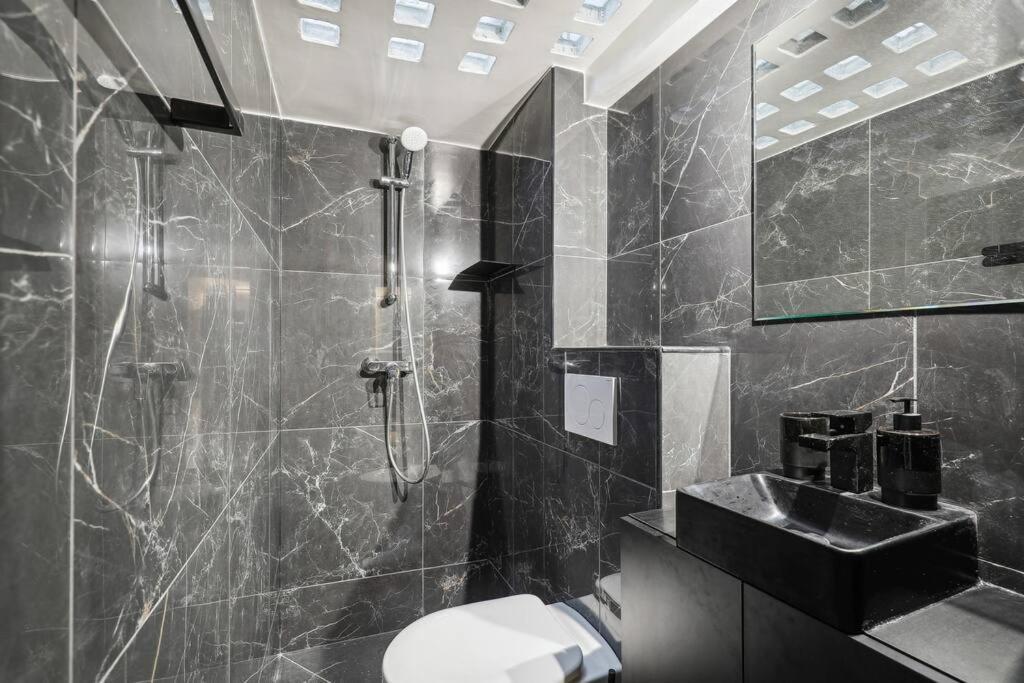 Appartamento Duplex Parisien Pres Du Louvre Esterno foto